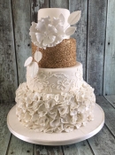 gold sequins and ruffles wedding cake