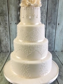 lace and pear wedding dress wedding cake design