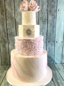 large-marbel-cake-with-delicate-ruffles