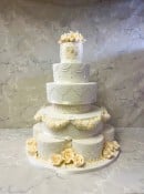 large-wedding-cake-hand-piped-with-sugar-roses-and-initals-