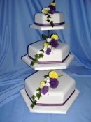 3 x hexagonal wedding cake on a stand