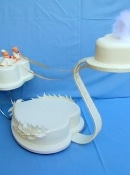 swan wedding cake on a stand