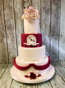 red-and-white-wedding-cake-with-drapes-and-pearls-