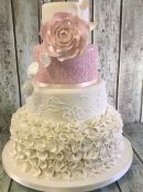 ruffles wedding cake with sparkly pink sequins