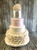 silver leaf and ruffles wedding cake