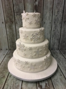 snow flake 4 tier wedding cake