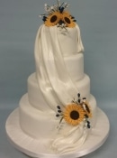 sunflower and drape wedding cake