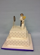 wedding cake couple playing darts