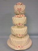 wedduing cake with pleated icing