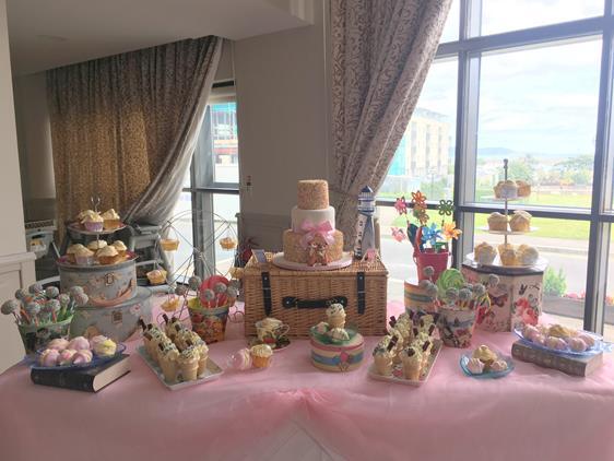 Vintage wedding  cake table and treats table seaside theme